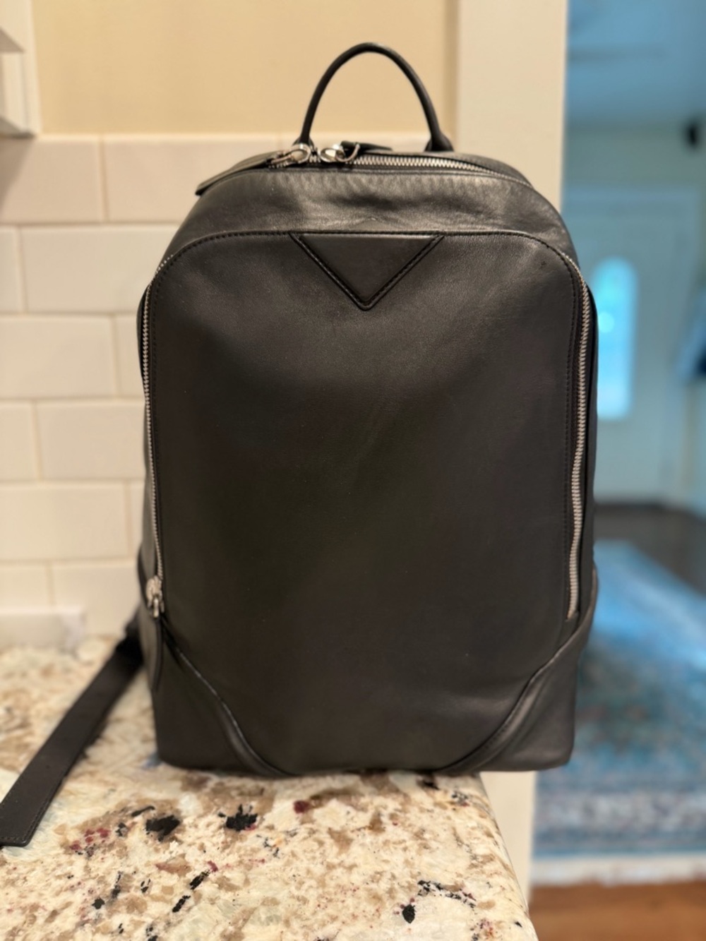 MCM Black Leather Men's Backpack with Silver Hardware